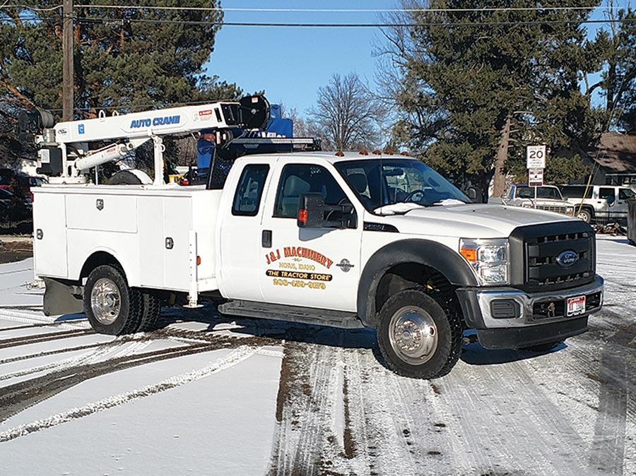 Store Front & White Service Truck